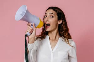 woman speaking into megaphone