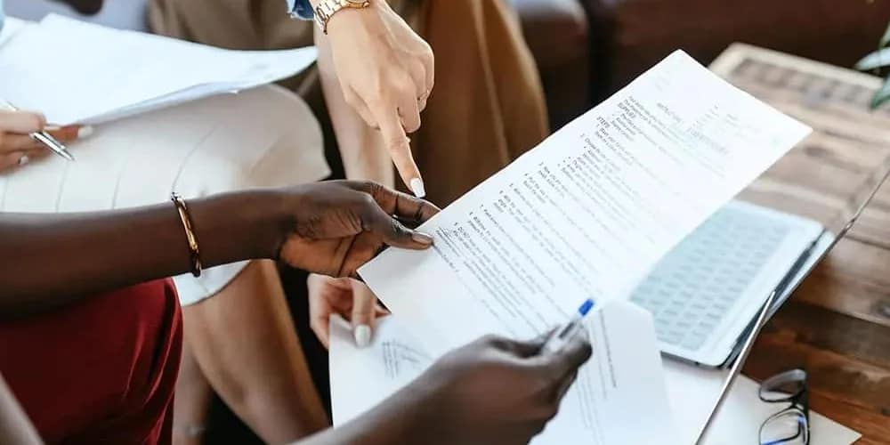 author reviewing a publishing contract