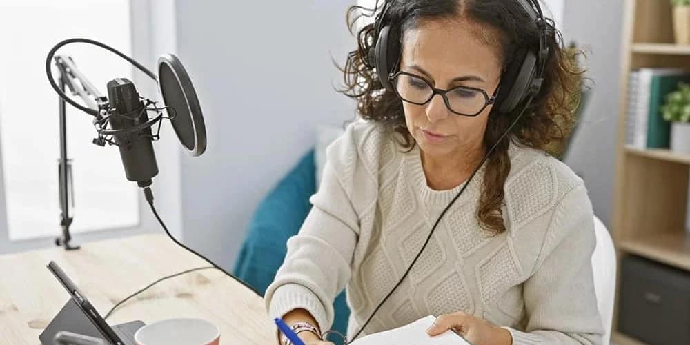 female podcasting host